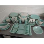 A large selection of Poole table ware including dinner service pale green on a grey ground