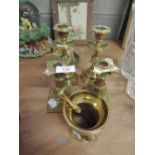 Two pairs of brass candlesticks and a brass pestle and mortar