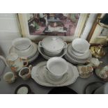 A German part dinner service by J L Menau and a coffee set