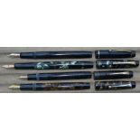 Four De La Rue fountain pens, three piston fillers, one lever fill