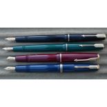 Four Parker Duofold fountain pens