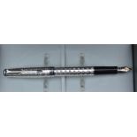 A Parker Sonnet fountain pen , silver tartan CL, uninked, 18k nib