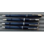 Four Parker Duofold fountain pens