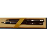 A Waterman rollerball and pencil set