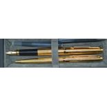 A Parker 75 pen and ballpoint, gold plated grain D'orge, uninked