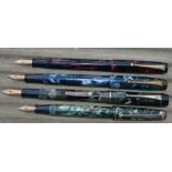 Four De La Rue fountain pens, lever fill