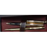 A Sheaffer Targa fountain pen and ballpoint, 1007 chequered, gold plated