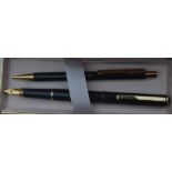 A Sheaffer Fashion fountain pen and ballpoint, dark grey