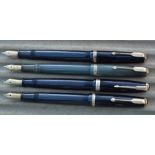 Four Parker Duofold fountain pens, button fill