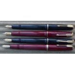 Four Parker Duofold fountain pens