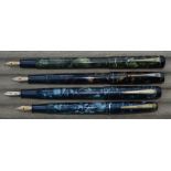 Three De La Rue lever fill fountain pens and one WHS Seal pen with DLR cap