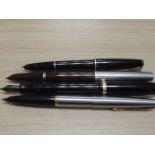 A Parker Lady 17, a Parker Duofold, and two other parker fountain pens