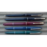 Five Parker 17 fountain pens