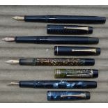 Four De La Rue fountain pens, piston fillers