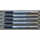 Five Parker 95 fountain pens