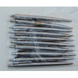 Six Parker Jotter stainless steel ballpoit pens and four pencils