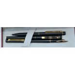 A Sheaffer Slim Targa fountain pen, rollerball and ballpoint, matt black