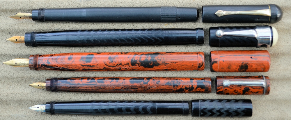 Five safety pens, including black 'WEUK', brown 'MOR'S' (France), Brown (France), black Edac (