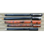 Five safety pens, including black 'WEUK', brown 'MOR'S' (France), Brown (France), black Edac (