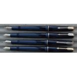 Four Parker Junior Duofold fountain pens