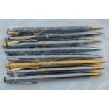 Six Parker Insignia ballpoint pens and two pencils