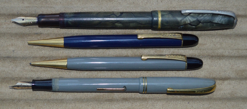 Two Burnham fountain pens and 2 pencils, one with 14k gold nib