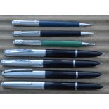 Four Parker 21 fountain pens and three pencils