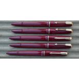 Five Parker Lady Duofold fountain pens, red