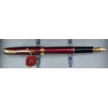 A parker Sonnet Fountain pen, laque ruby red GT, uninked and in original packaging