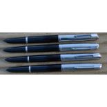 Four Parker 51 fountain pens