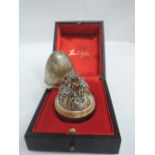 A Stuart Devlin silver gilt surprise egg for year 1979, Limited Edition no: 170 containing a spray