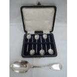 A cased set of six silver coffee spoons having architectural terminals, Birmingham 1928, William