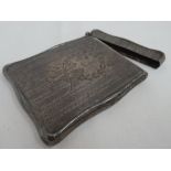 A silver card case of shaped form having engine turned and scroll & bow decoration, Birmingham 1911,