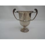 A small silver trophy presented by the RAF in the 440 yards championship 1920, having scroll handles