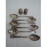 Six HM silver teaspoons of plain form, monogrammed AT to terminals and a pair of white metal