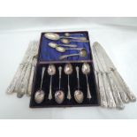 A cased set of HM silver teaspoons having twist stems and fan terminals a part set of HM silver