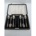 A cased set of six silver teaspoons with matching sugar nips, Birmingham 1936, Arthur Price & Co