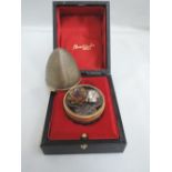 A Stuart Devlin silver gilt surprise egg for year 1973, Limited edition no 170, containing a