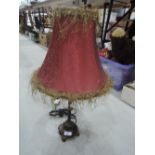 A modern period style table lamp