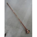 A copper post horn