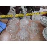 A selection of cut glass including decanters