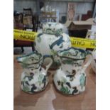 A selection of Masons Ironstone Chartreuse jugs and jar