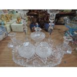 A selection of glassware including candlesticks, dressing table pots etc