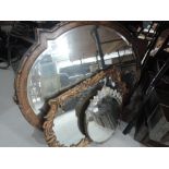 An oak framed oval mirror, gilt framed mirror etc