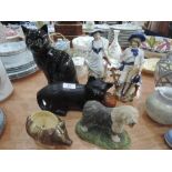 A pair of dresden style figures, two cat ornaments etc