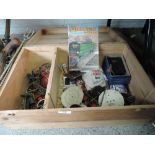 A wine box containing vintage meccano and Meccano magazine