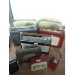 A collection of vintage radios including Bush, Caravelle, Hacker and Dynatron etc