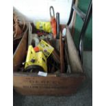 A wooden fruit box Derfel yellow cling peaches, containing vintage tools and brushes