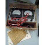 A boxed volt meter tester by Runbaken Manchester