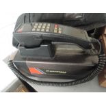 A Motorola partner 4500X vintage mobile/car phone with battery